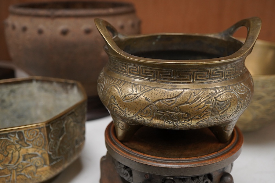 A Chinese bronze bowl, cover and bowl, mustard canister pot, largest bowl 24cm diameter